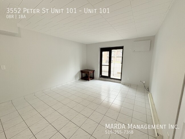 Photo - COZY MAIN FLOOR BACH NEAR U OF W - INCLUSIVE! Unit 101