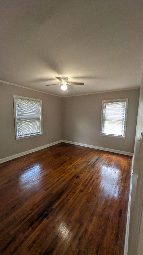 Photo - Cozy 2-Bedroom Home with Hardwood Floors & Spacious Yard