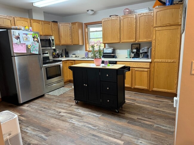 Photo - Spacious 3BR Duplex with Finished Basement & 2-Car Garage in Otsego Unit 1389