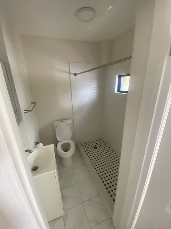 Building Photo - 9305 Flatlands Ave Unit 2