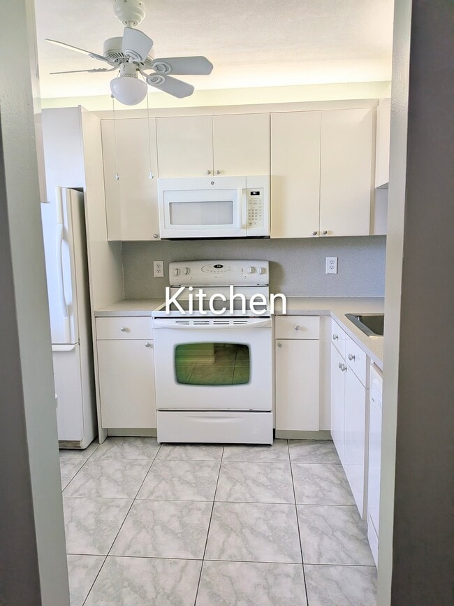 Building Photo - 7190 Golf Colony Ct Unit Apt 104