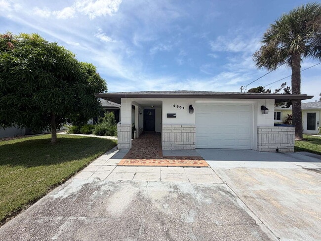 Building Photo - "Charming 2-Bed, 2-Bath Retreat in New Port Richey - Cozy Living at 4931A Pompano Drive!"