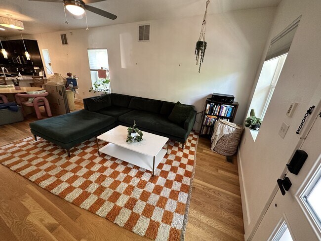 Photo - "Charming 2-Bed, 2-Bath Home with Gleaming Hardwood Floors in Vibrant Denver!"