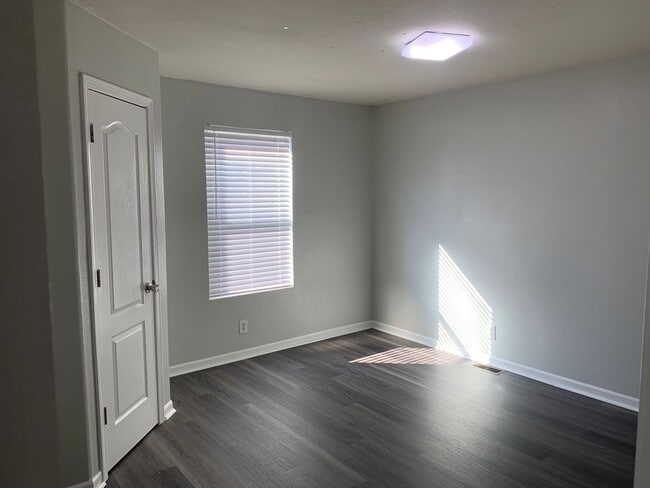 Photo - Super cute and updated with fresh paint, new floors, some fixtures, and all appliances.