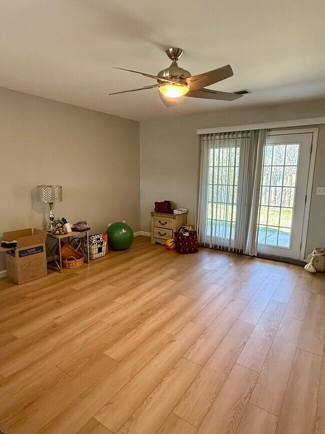 Photo - Updated 3BR Home with Laminate Flooring Throughout & Spacious Yard