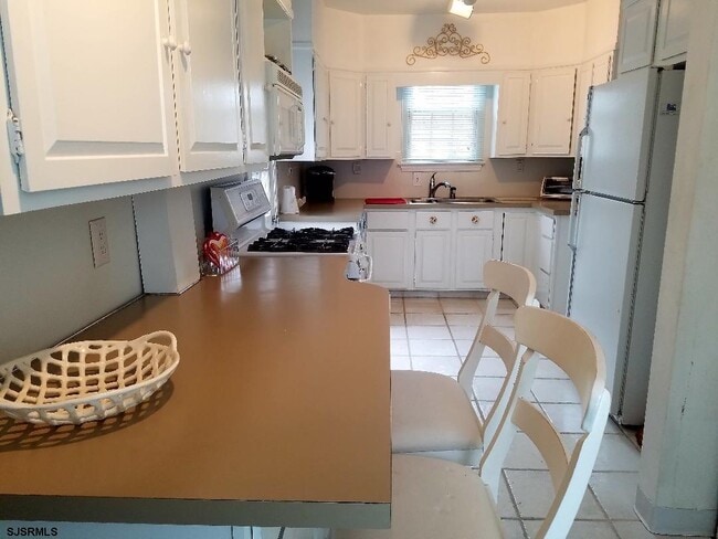 Photo - 8606 Monmouth Ave