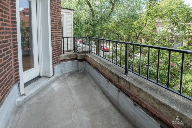 Photo - Modern 4BR Apartment with Hardwood Floors, Balcony & Central A/C Unit 2