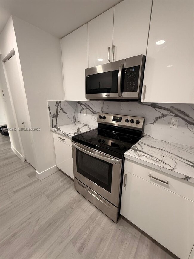 Building Photo - 8240 SW 210th St Unit 203