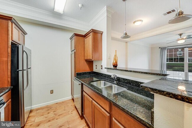 Building Photo - 1550 Spring Gate Dr. Unit 8103