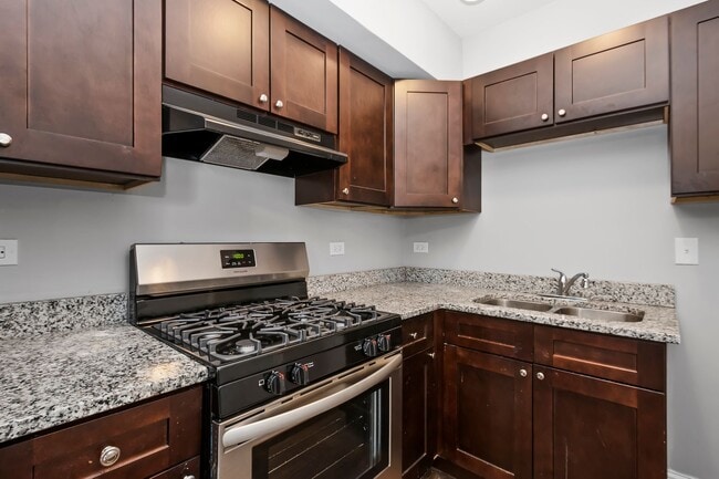 Photo - New Renovation - Condo Quality 2-bedroom Apartment! No Security Deposit! Unit 7117 #2