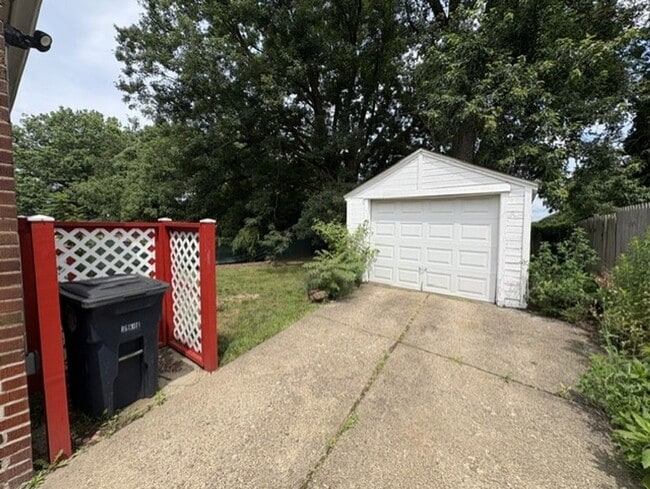 Photo - Charming 2-Bedroom Brick Home with Central Air, Garage & Spacious Backyard