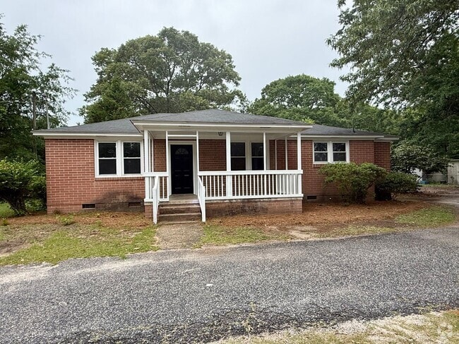 Building Photo - Brick Home with Fenced Yard!