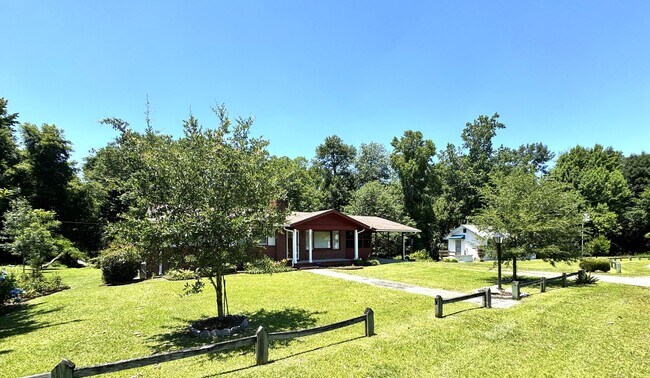 Photo - Convenient 3BR Home with Water & Lawn Care Included