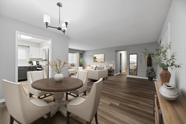 Elevate your living at Lake Shore Park Apartments, where modern design meets comfort. Enjoy spacious interiors, a stylish dining area, and a serene atmosphere. Don't miss your chance to call this vibrant community home—schedule a tour today! - Lake Shore Park Apartments