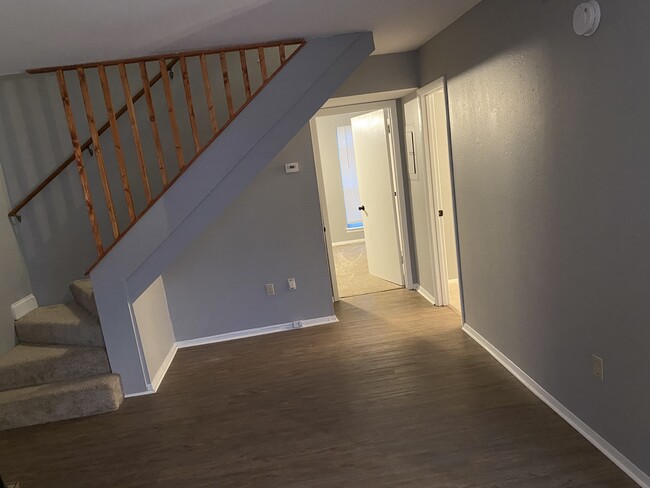 Living room and stair well - 900 Mountain Creek Rd Condo Unit F-83
