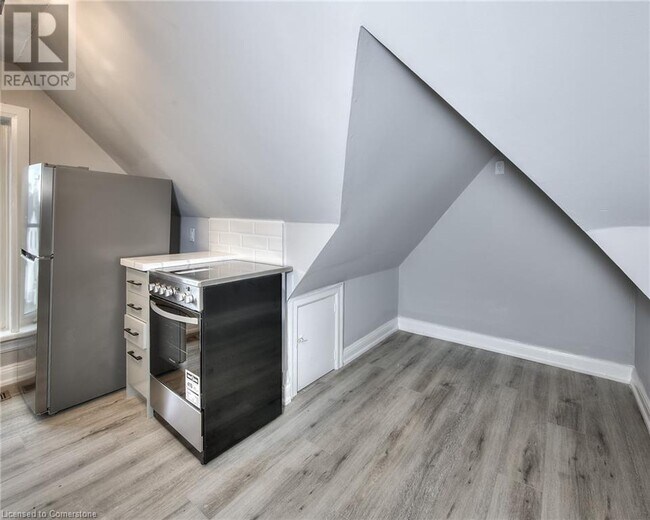 Photo - Unbeatable Value! Den Unit on Top Floor in Kitchener | $1299 ALL-INCLUSIVE | Parking & Laundry Unit 4