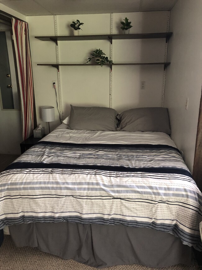 Queen sized bed - 969 E State St Unit Apt