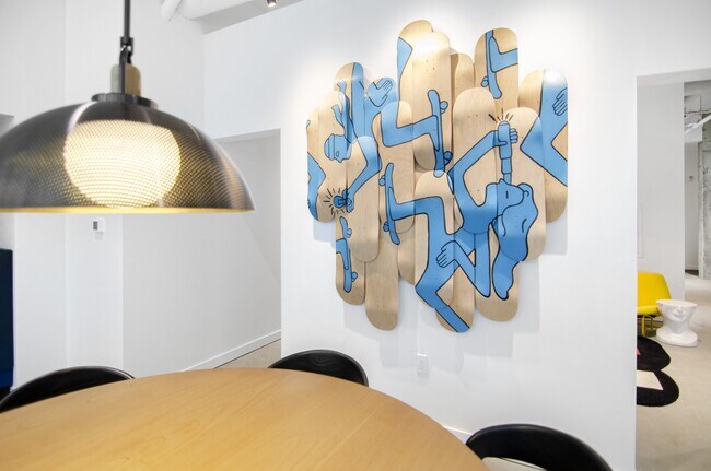 Admire the artwork on the wall in this room at Alt Capitol Hill.