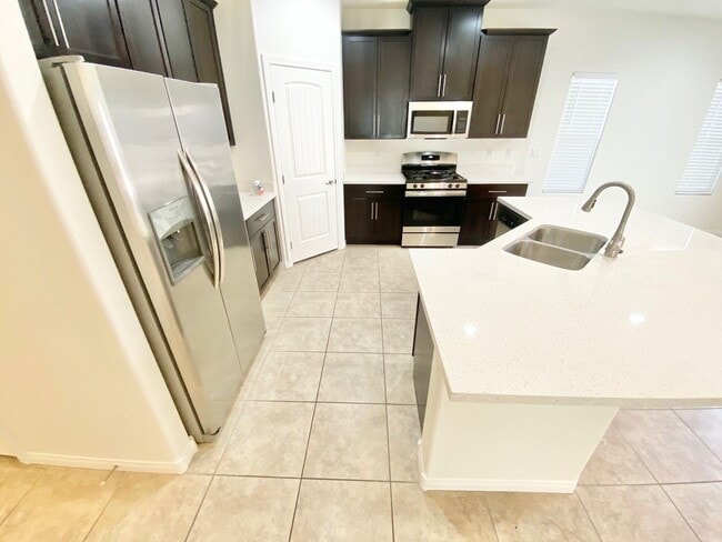 Photo - STUNNING 3 BEDROOM 2 FULL BATH SINGLE STORY FAMILY HOME WITH 2 CAR GARAGE