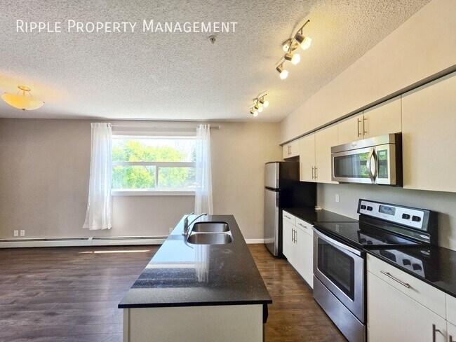 Photo - SUN-DRENCHED & SPACIOUS | 3 BEDS, 1 BATH CONDO | PRIME MT PLEASANT LOCATION Unit 304