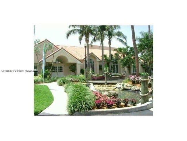 Building Photo - 3390 Pinewalk Dr N Unit 1038 Rental