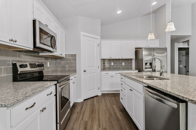 Photo - Beautiful 4bd/2ba Single Level Home w/RARE 4-CAR GARAGE