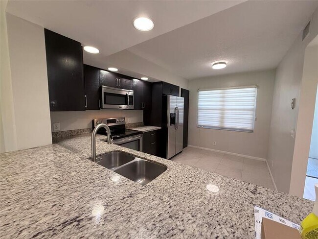 Photo - 1201 SW 128th Terrace Unit 104 E