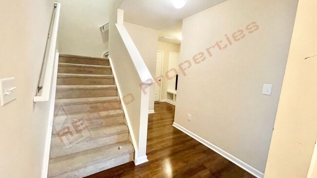 Photo - 3 Story Townhome 3 Bedrooms Rear Entry 2 Car Attached Garage with 1st Floor Bedroom, Community Po...