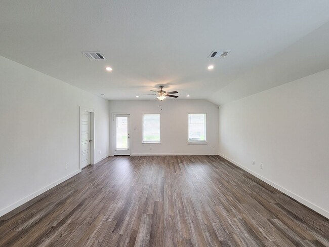 Photo - This stunning 4-bedroom, 2-bathroom Rosharon lease features modern upgrades, an open-concept layo...