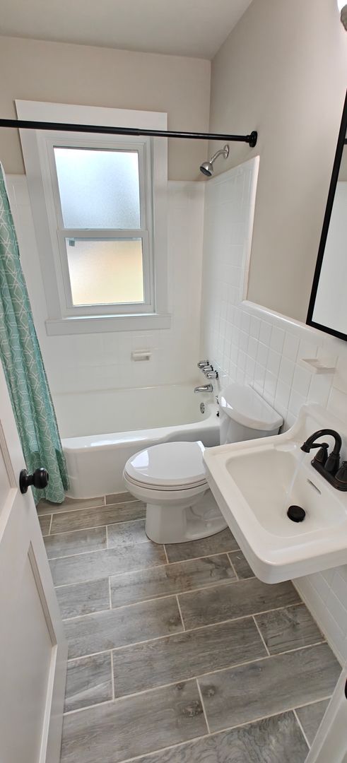 Photo - Renovated 4 bedroom cape with large fence yard