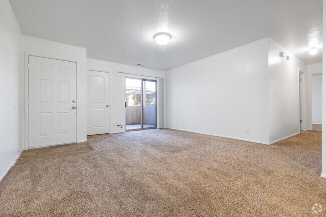 2BR, 1BA - 1,000SF - Living Room - Falcon Park Apartments