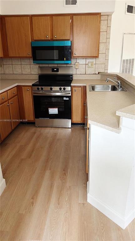 Building Photo - 2445 SW 18th Ter Unit 124