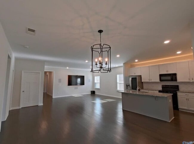 Photo - "Charming 3-Bed Oasis with Granite Touches & Hardwood Elegance and loads of high tech upgrades in...