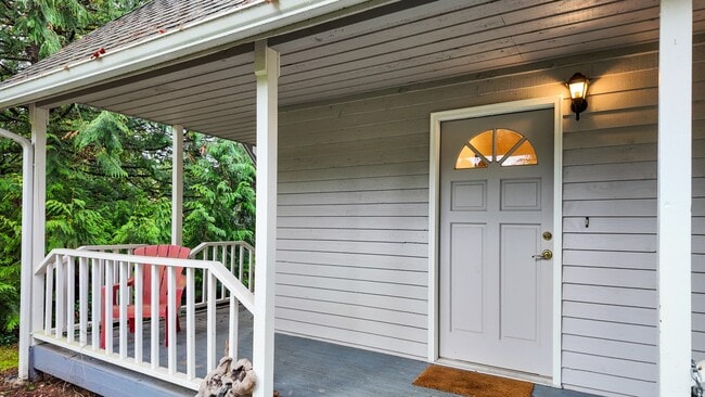Photo - Bright 3-Bed Bothell Home with Attached Garage, Cozy Fireplace, and Private Garden Oasis
