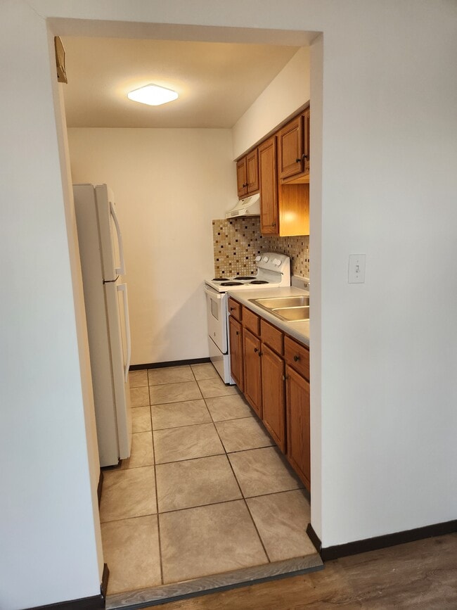 Bright kitchen w/cabinets on both sides - 212 N 44th St Unit #5 The Danielle
