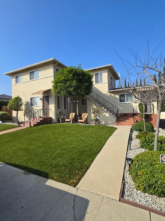 Building Photo - 7835 1/4 Flight Ave Unit One Bedroom