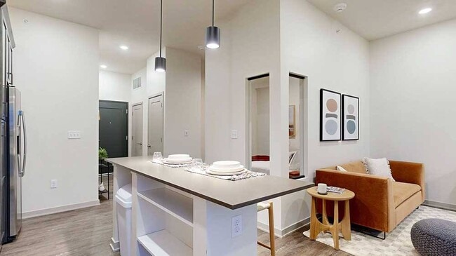 Even our studio homes feature spacious islands, offering a stylish and inviting open layout that's perfect for enjoying meals and entertaining. - Brynwood at Wilderness Ridge