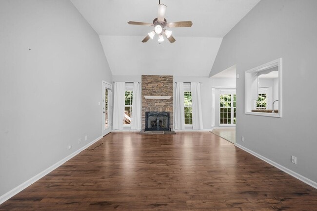 Photo - Stunning Stone Fireplace • Finished Basement • Fenced Yard