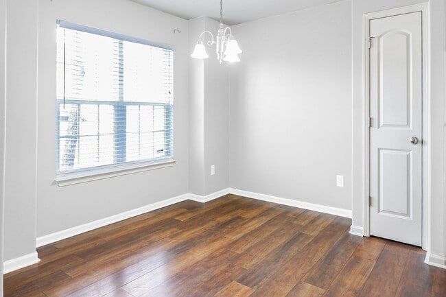 Photo - pdated 2BR/2.5BA Townhome with Private Fenced Patio