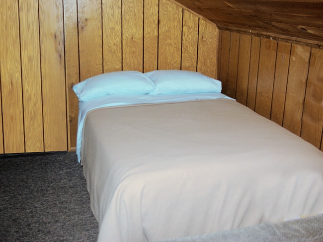 Double bed for guests. - 26180 Whispering Oak Ln Unit Talahi Studio