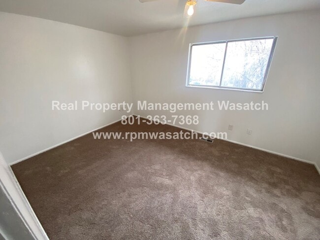 Photo - Check Out This Charming 3 Bedroom 1.5 Bathroom Condo in Midvale Ut!