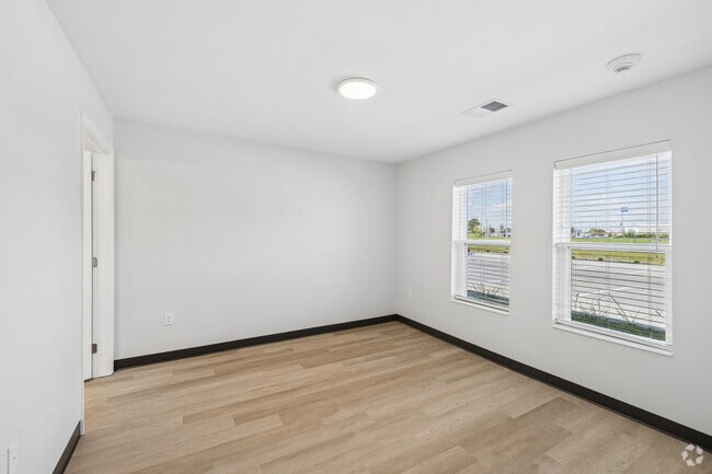 3BR, 2BA - 1,097SF - Primary Bedroom