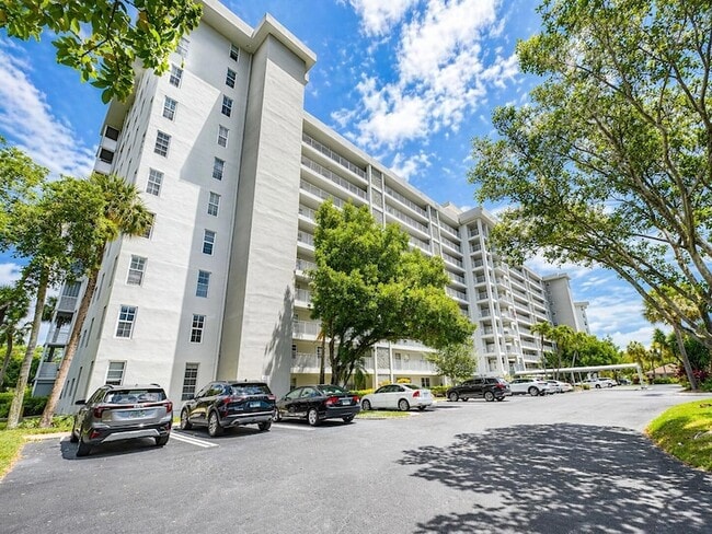 Building Photo - 4015 W Palm Aire Dr Unit 205