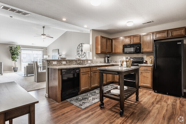 Spacious Kitchen with Granite Countertops - Bedford Place Apartments