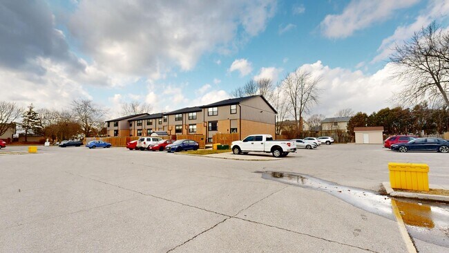 Building Photo - MODERN 3 BEDROOM TOWNHOME ON ANDOVER DRIVE Unit 24