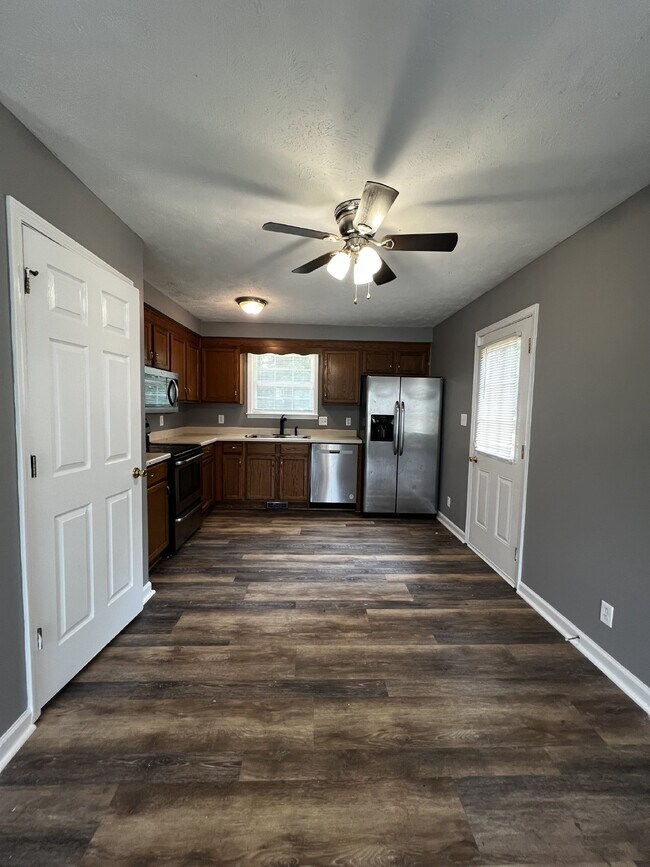 Photo - Charming 3-Bedroom Home with 2 Full Bathrooms, and a spacious 2 car attached and detached 2 car g...