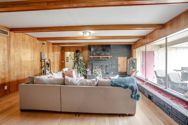 Photo - Spacious 4-Bedroom Home with Dual Living Areas