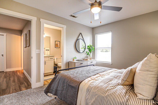 2x2 Primary Bedroom - The Ridges at Bentonville Apartments