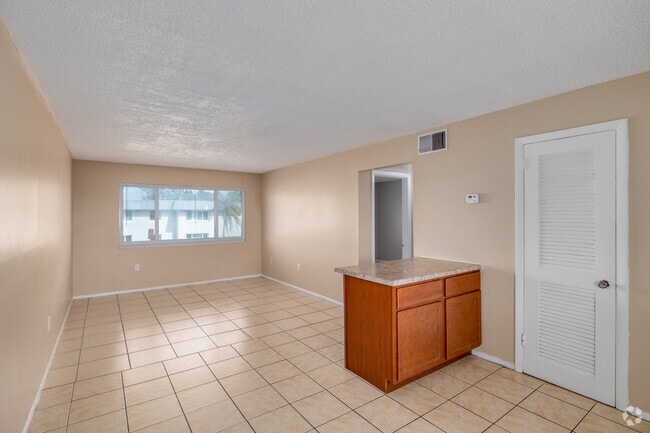 1BR, 1BA - 625SF - Living Room - Palm Villas