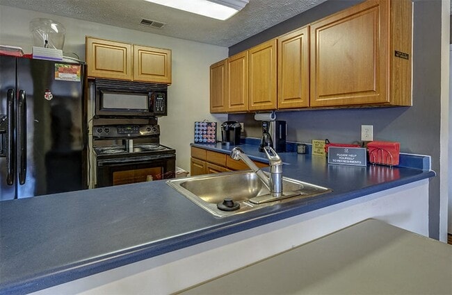 Clubhouse Kitchen at Mann Village - Mann Village Apartments
